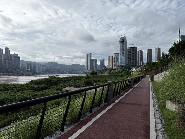 An early morning sweaty run along the Jiangbeizui Riverbank Park in Chongqing, China on July 24, 2025. A comparable environment would be if Miami had a heat wave in the dead of summer and then got sucked into hell. An early morning sweaty run along the Jiangbeizui Riverbank Park in Chongqing, China on July 24, 2025. A comparable environment would be if Miami had a heat wave in the dead of summer and then got sucked into hell.