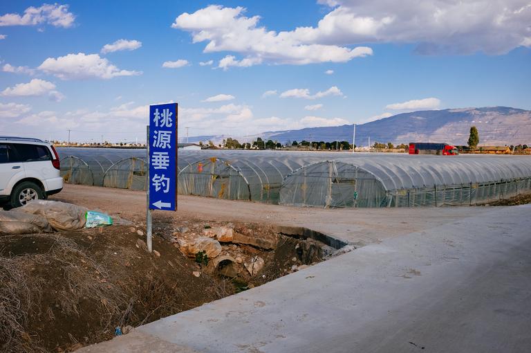 A crossroad on my walk through the neighborhood. Luliang County is nestled in a flat valley with some modest mountains to the east.