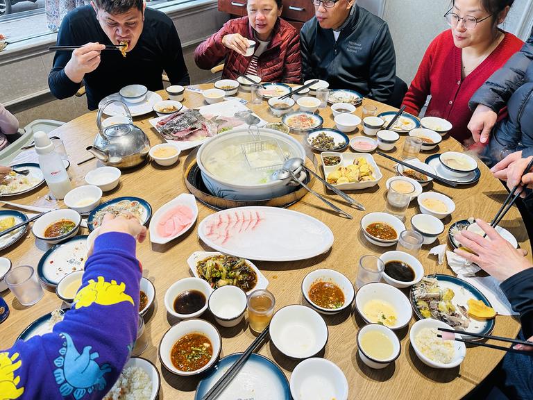 This fish hot-pot meal was a much needed relief from the recent cool weather and to ease the symptons of over-drinking the night prior. Much of southern China does not centrally heat their businesses or homes. There really isn’t a need for it as the coldest it gets in the wintertime is easily addressable with a thick coat. So warm meals take on additional importance.