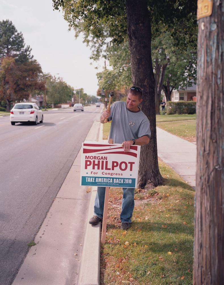 Members of the David County Tea Party canvasing the surrounding suburbs and installing signs for Morgan Philpot’s campaign in 2010.