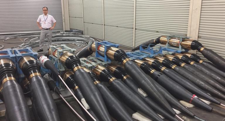 Submarine cable SMART repeaters stacked in a factory for testing. Source report from the European Commission. Submarine cable SMART repeaters stacked in a factory for testing. Source report from the European Commission.